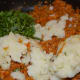 Step six: Add mashed potatoes and chopped coriander leaves. Mix well.
