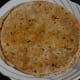 Step twelve: Cook the parathas.
