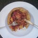 Enjoying spicy chicken stew in giant turmeric Yorkshire pudding