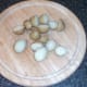 Potatoes are halved for deep frying