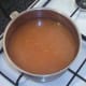 Simmering rice in turmeric water