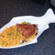 marlin fillet is laid on rice bed