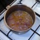 Simmering onion gravy