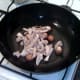 Frying chicken and mushrooms