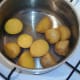 Turmeric boiled potatoes are left to cool