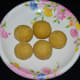 Step three: Add powdered sugar and cardamom powder. Add some more ghee if you feel the mix is dry. Make fist size balls. Besan ladoo is ready to serve.