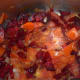 Step five: Add chopped beetroot. Continue stir-cooking for a while.