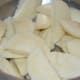 Step 6: Cut each dumpling in half.
