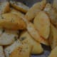 Step 8: Make a tempering using oil, mustard seeds, white lentils, hing, and curry leaves. Add the dumplings and toss the pan to ensure equal tempering coating on the dumplings.