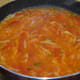 Step seven: Add 2 glasses of water and bring to a boil. Add corn flour mixture. Continue boiling for 1 minute.