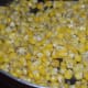 Step six: Buttered sweet corn is ready to serve.