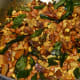 Step two: Mix all the fried ingredients with the seasonings and spices.