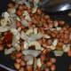 Step three: Shallow-fry the ingredients one by one in the pan as per instructions.