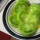 place tomato slices in egg