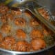 Step six: Fry until they become golden brown in color. Cooking a batch may take about 5 minutes.