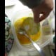 Dip flour-covered slice into egg.