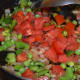 Step five: Add chopped tomatoes. Continue stir-cooking till tomatoes become soft and not mushy.