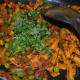 Step nine: Add chopped coriander leaves. Mix once. Baby corn dry masala curry is ready!