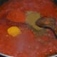 Step six: Add turmeric powder, red chili powder, garam masala powder or curry powder, coriander powder, sugar, and salt.