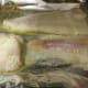olive oil under fish, spray butter on top