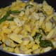 Step six: Mix everything and stir-cook for one more minute.