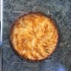 Cooled and topped with apricot preserves.