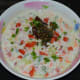 Step five: Pour the tempering on the raita.