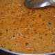 Step seven: Boil the jaggery syrup until you reach two-string consistency. Refer to the instructions to know how to get the right consistency.