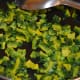 Sauté the bitter gourd in oil.