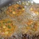 Step four: Fry the patties in hot oil in batches. Make sure you fry long enough so that the inside is fully cooked. Each batch takes about 6-7 minutes for frying.