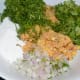 Step two: Take ground mix, rice flour, chopped onions, finely chopped dill leaves, coriander leaves, curry leaves, hing, hot oil, and salt. Mix well to make a firm dough.