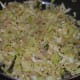 Step six: At this stage, cabbage should become almost transparent. Turn off the fire. Transfer the contents to a mixing bowl.