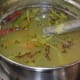 Step five: Add turmeric powder, sugar, and salt. Add enough water to get liquid consistency. Boil the mix for 4-5 minutes. Add lemon juice and finely chopped coriander leaves. Just boil once. Turn off the fire. Add tempering.