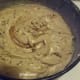 This is the chocolate sponge batter in a round baking tin before baking.