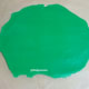 This is the green ready-to-roll icing (fondant) I bought in the shop. I flattened it to cover the top of the sponge cake.