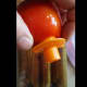 poke into tomato by stem