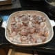 Poured over the chicken, this is the dish before it is braised in the oven.
