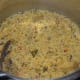 Mix well. Your spicy vegetable khichdi is ready!