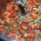 Throw in chopped tomatoes and sauté for 1 minute.