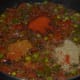 Step six: Add red chili powder, turmeric powder, coriander powder, and gram masala powder. Stir-cooking continues for a minute.