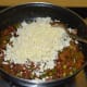 Step seven: Add grated paneer.