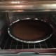Baking the first pie in the oven.