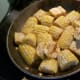 Seasoned corn cob and butter.