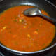 Step ten: Add a cup of water. Bring the mix to a boil. Continue boiling till you get the right consistency.