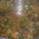Step seven: Add about three cups of water. Boil the mix for 5-6 minutes. Stir it at intervals. Further, close the cooker lid and place the weight. Cook it up to 2 whistles and simmer for 7 minutes. Turn off the stove.