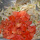 Step three: Add chopped tomatoes. Increase the flame. Stir-cook till they become mushy.
