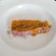 Turmeric and black pepper scattered on pork steak