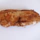 Fried pork steak is set aside to rest