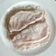Pork steaks patted in chilli flour
