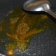 Step two: Heat oil. Add mustard seeds. Let them splutter. Add turmeric powder and hing powder. Saute for 5 seconds.